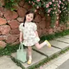 Nueva colección de verano: Conjunto de dos piezas para niñas con estampado de cerezas dulces para bebés, de diseño estilo coreano, perfecto para el verano y apto para exportación