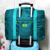 Bolsa de equipaje de viaje al por mayor al contado, funda portátil, bolsa de viaje con carrito, bolsa de almacenamiento portátil de gran capacidad para acabado de ropa