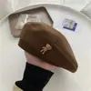 Nuevo gorro de lana de otoño e invierno, boina de moda estilo británico, sombrero de pintor retro versátil, muestra cara pequeña, boina para hombres y mujeres