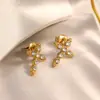 Aretes de Acero Inoxidable Transfronterizos, Personalizados, Sencillos, Modernos, Versátiles, en Forma de Cruz, Incrustados con Circonita, Chapados en Oro de 18 Quilates, Aretes Impermeables