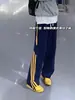 Pantalones de chándal resistentes de color azul marino estilo retro americano para hombre, pantalones deportivos casuales a rayas de moda para otoño e invierno, corte limpio