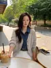 Cárdigan de punto patchwork de mezclilla con solapa para mujer, nuevo estilo primavera/otoño 2026, top de imitación de dos piezas, chaqueta suéter holgada y elegante