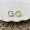 Pendientes de perla de agua dulce en espiral diseño temperamento de celebridad de internet atmósfera de alto nivel pendientes nuevos pendientes de aguja de plata s925