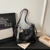 Bolsa de Grande Capacidade para Mulheres 2026 Primavera Nova Estilo Coreano Casual Couro Macio Bolsa de Ombro Transversal para Trabalho e Deslocamento Bolsa Tote