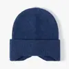 Otoño e invierno Nuevo gorro de punto para mujer de algodón cachemir moda Joker gorro de lana para hombre protección cálida para las orejas al aire libre fabricantes venta al por mayor