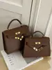 Bolso Kelly Vintage para Mujer 2024 Nuevo Modelo Bolso de Hombro Simple de Moda Bolso de Mano con Textura Única Bolso Cruzado
