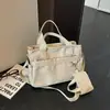 Bolsa de Mão com Alça de Ombro Estilo Menina Doce Cool Picante Feminina 2026 Nova Bolsa Tote de Grande Capacidade para o Dia a Dia Bolsa Simples Casual de Ombro