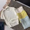 2026 Nova Moda Estilo Coreano Camiseta Fashionável de Gola Redonda Manga Curta para Mulheres com Design de Barra Solta Que Parece Emagrecedor e Versátil Top de Tricô