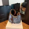 Nova Bolsa de Axila Outono 2025 Estilo Coreano Feminina Bolsa de Ombro de Nicho Bolsa Transversal Estilo Ocidental Bolsa de Ombro Casual para o Dia a Dia