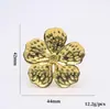 Anillo de servilleta de flor de cinco pétalos simple transfronterizo blanco con gota de aceite, anillo de servilleta de flor de ciruelo dorado, juego de mesa para hotel