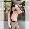 Suéter de punto grueso liso estilo coreano con cuello redondo para mujer, nuevo modelo primavera 2026, top interior de punto petite que reduce la edad