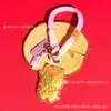Llavero de flor de dinero de oro macizo de dibujos animados lindo, colgante creativo del año zodiacal, pequeño recuerdo para exposiciones y reuniones anuales, al por mayor
