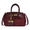 Bolso de mujer vintage esmerilado para otoño e invierno 2026 nuevo diseño de moda bolso cruzado versátil bolso de mano súper popular bolso platino