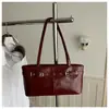 Bolsa de ombro feminina de nicho de alta qualidade 2025 nova tendência moda simples versátil bolsa de axila para trabalho pequena bolsa de mão