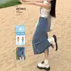 Falda de Mezclilla con Abertura para Mujer Primavera y Otoño 2025 Nueva Cintura Alta Holgada Figura A Elegante Longitud Media Recta Cadera Falda