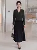 Falda de traje para mujer Feiyuan, elegante y estilosa, estilo casual de negocios para ir al trabajo, nueva falda de línea A versátil de color liso para otoño e invierno