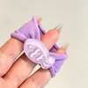 Modernas y coloridas nuevas ligas para el cabello 2026, accesorios versátiles para el cabello inspirados en la dopamina para niños, diademas de alta gama con temática de dulces M&M