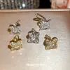 Clip para oreja de flor de circón bañado en oro real de 18k, no requiere perforación, sensación de lujo ligero de alta gama, clip para cartílago de la oreja, aretes de diseño nicho