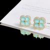 Pendientes Exquisitos de Flor de Cuatro Hojas de Proteína Super Brillantes para Mujer Aguja de Plata S925 Lujo Accesible Pendientes de Gama Alta Pendientes Versátiles para Ropa de Trabajo