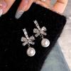 Elegantes pendientes de perlas con lazo para mujer, de plata con diamantes de imitación y un nicho de Año Nuevo, elegantes y combinables.