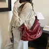 Bolsa de mano de cuero encerado para motocicleta para mujer, nueva colección otoño/invierno 2026, estilo retro, diseño único, sensación de alta gama, gran capacidad, bolso de hombro o bolso cruzado