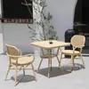 Departamento de ventas de muebles de ratán para exteriores patio exterior jardín mesa y silla pequeñas de ocio combinación de mesa de comedor para balcón exterior de villa