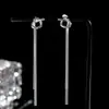 Diseño de nicho estilo frío borla anudada aretes largos elegantes lujo ligero personalidad moda aretes de botón para orejas combinan con todo