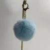 Venta Directa de Fábrica Colgante de Bola de Pelo de Conejo Sintético Accesorios para Mascotas Materiales para Juguetes Colgante para Bolso Llavero Bola Redonda