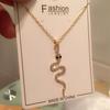 Estilo frigid europeo y americano temperamento de moda pendientes con forma de serpiente sentido senior zodiaco serpiente diamante brillante pendientes sencillos mujer