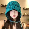 Gorro de punto hueco tejido a mano con borlas florales para mujer, adecuado para fotografía y viajes en el oeste de Sichuan, turbante elegante y único