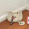 Bolso bandolera retro al por mayor 2026 para mujer, nuevo bolso tipo cubo de alta gama, bolso de hombro de moda para el día a día