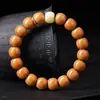 Pulsera de Cuentas de Cabeza de Mono de Material Llama de Dragón Premium, Cuentas Perfectamente Redondas Brillantes, Pulsera Budista Suave Envuelta en el Dedo para Hombre Retorcida a Mano Venta al por Mayor
