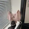 Bolso de lunares para mujer 2026 nuevo de moda de verano para ir al trabajo de un solo hombro para llevar debajo del brazo diseño de nicho moderno bolso de un solo hombro