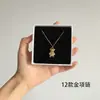 [56] logotipo de comercio exterior sin marca acero de titanio joyería Europa y Estados Unidos variedad de hip-hop apilado collar de clavícula de acero de titanio