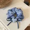 Elástico de cabelo tipo scrunchie em formato de coração com laço fofo de camada dupla para mulheres, novo acessório de cabelo versátil da moda para sair