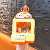 Llavero Creativo de Dibujos Animados Máquina de Garra Brillante Atrapador de Bolas Juguete para Aliviar el Estrés Colgante Regalo Venta al por Mayor