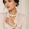 Joyería transfronteriza europea y americana, estilo frío, retro, con cadena de cuentas, collar con diseño de nicho de perlas de imitación nacionales.