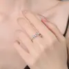 Bestseller internacional anel de prata de lei s925 cravejado de diamantes moissanite, anel com aro torcido, anel simples versátil estrelado para mulheres, atacado