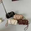 Bolso de mano de cadena con patrón de rombos retro, diseño cilíndrico, colección de otoño para mujer, chic y lujoso, versátil, y exuda una sensación de alta gama, adecuado para llevar al hombro o cruzado