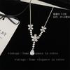 Moderna cadena para la clavícula de lujo ligero, elegante, con forma de mariposa y flor, y concha, para mujer, combinable, estilo ins de alta calidad en oro