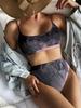 Traje de baño dividido nuevo 2025 para mujer, bikini sexy de color sólido europeo y americano, traje de baño cruzado de cintura alta, venta al por mayor de bikini
