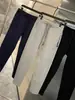 ¡Estilo de pierna cónica! ¡Tejido Toray de capa de aire! Bolsillos con cremallera color liso de moda versátiles pantalones casuales pantalones de chándal pantalones para hombre