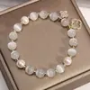 2025 Nova Pulseira de Vidro Olho de Gato Imitado Trevo de Quatro Folhas Cordão Elástico Nicho Pulseira de Pérolas