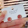 Pendientes Fu elegantes de color rojo de Año Nuevo, adecuados para pendientes de Año Nuevo, de color rojo brillante y redondos con diamantes, pendientes de estilo nacional de alta calidad.