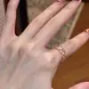 Anillo liso ajustable para el dedo índice, anillo simple para mujer estilo ins, accesorio para mano de hombre al por mayor, versión coreana de alta gama, anillo que no se decolora