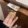 Pendientes de Borla de Fuegos Artificiales con Cuentas Doradas Diseño de Moda para Mujer Pendientes de Lujo Ligero Elegantes Pendientes de Gama Alta Elegantes Pendientes Delicados
