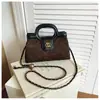 Bolso pequeño de cadena con patrón de rombos estilo Chanel con cierre de broche para mujer, nueva colección otoño/invierno 2026, bolso de hombro/bandolera moderno y sofisticado