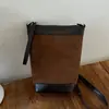 Bolso para teléfono de moda retro transfronterizo otoño 2026, bolso de hombro para mujer, bolso pequeño versátil con un toque de alta gama