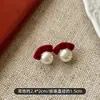 Pendientes de Perla con Lazo de Terciopelo Rojo para Mujer, Pendientes de Alta Gama para Otoño e Invierno, Nuevos Pendientes Populares Exquisitos de 2025