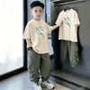 Camiseta Infantil 100% Algodão 2026 Nova Verão Estilosa Manga Curta Fina para Crianças Pequenas Roupas de Verão